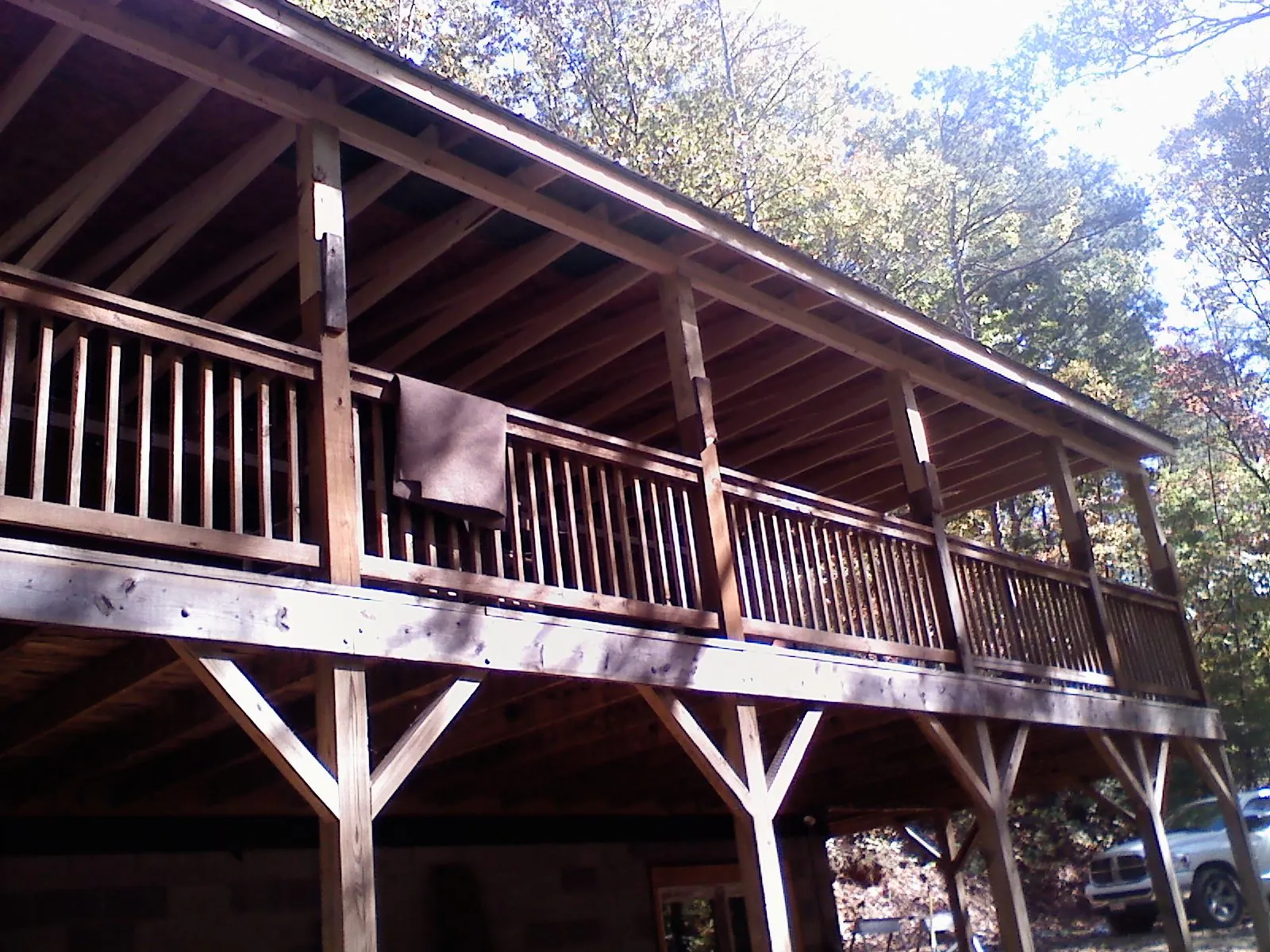 Timber framing under a new elevated porch and deck — Roof Leak Repair in Kremmling by Roofing Brothers